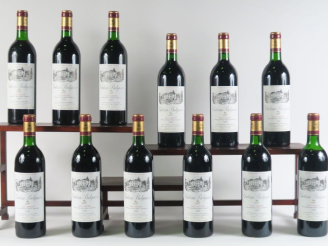 Vente aux enchères 12 BOUTEILLES CHÂTEAU BELGRAVE GCC HAUT MÉDOC - 1986 - CBO - 10 BG/1 L