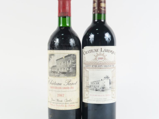 Vente aux enchères 2 BOUTEILLES ST ÉMILION GC : 1 CHÂTEAU LAROQUE 1989 BG - 1 CHÂTEAU PAN