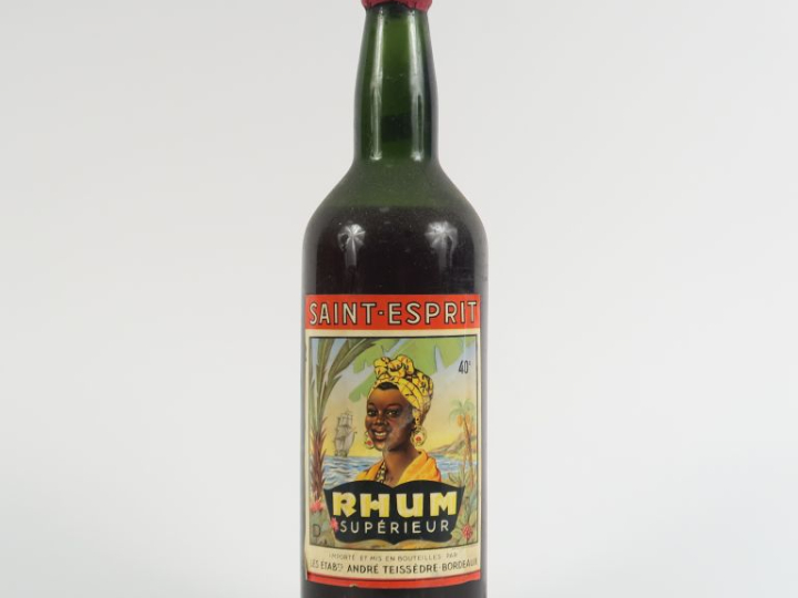 1 VIEILLE BOUTEILLE (1 L) RHUM SUPÉRIEUR SAINT ESPRIT - NIVEAU LÉGÈREM
