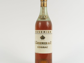 Vente aux enchères 1 VIEILLE BOUTEILLE COGNAC CUSENIER - NIVEAU BAS