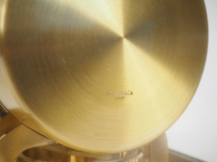 JAEGER-LECOULTRE. Pendule ATMOS en bronze, laiton et verre. Signée et 