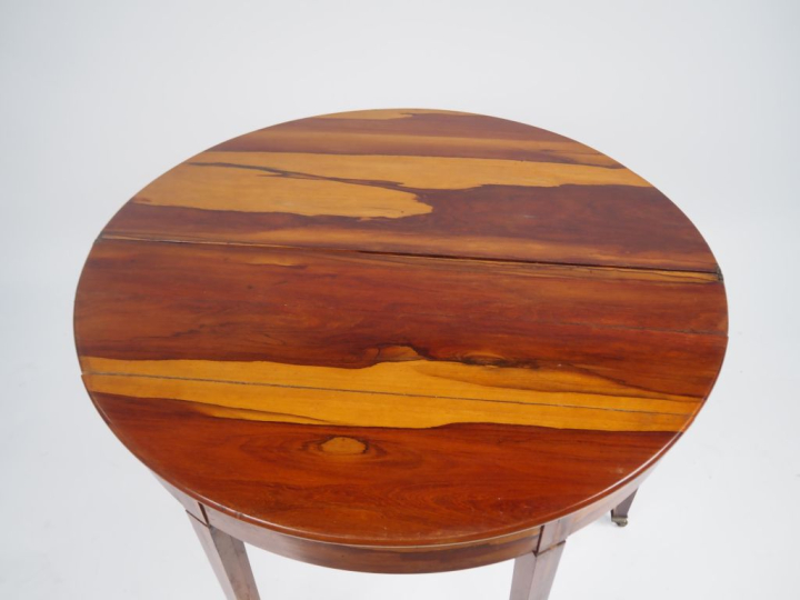 Table demi lune début XIXème en bois exotique, plateau circulaire à ab