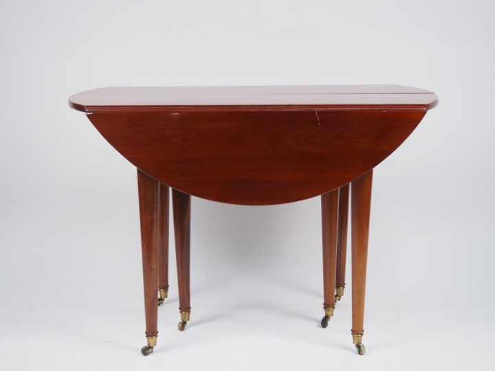 Table à abattants et à  allonges début  XIXème de style Louis XVI en a