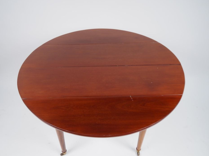 Table à abattants et à  allonges début  XIXème de style Louis XVI en a