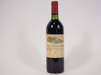 Vente aux enchères 1 BOUTEILLE TROPLONG MONDOT GCC ST EMILION - 1982 - BG/ELT/INSCRIPTION