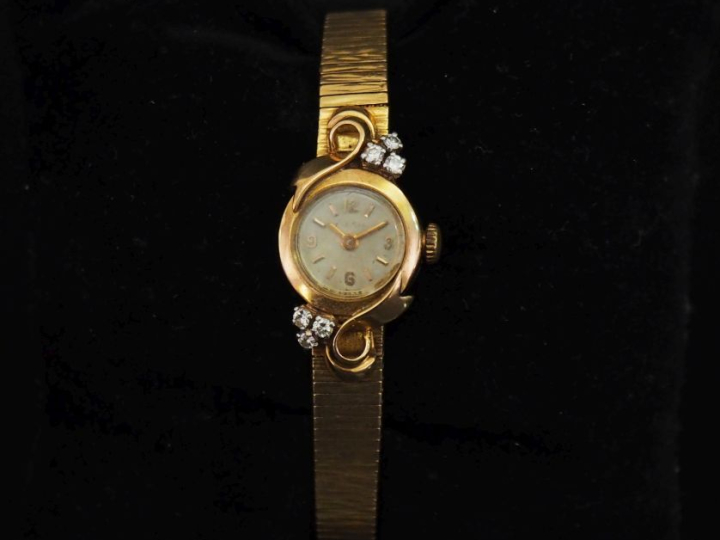 ESKA Montre bracelet de dame, boitier et bracelet en or jaune 750. Cad