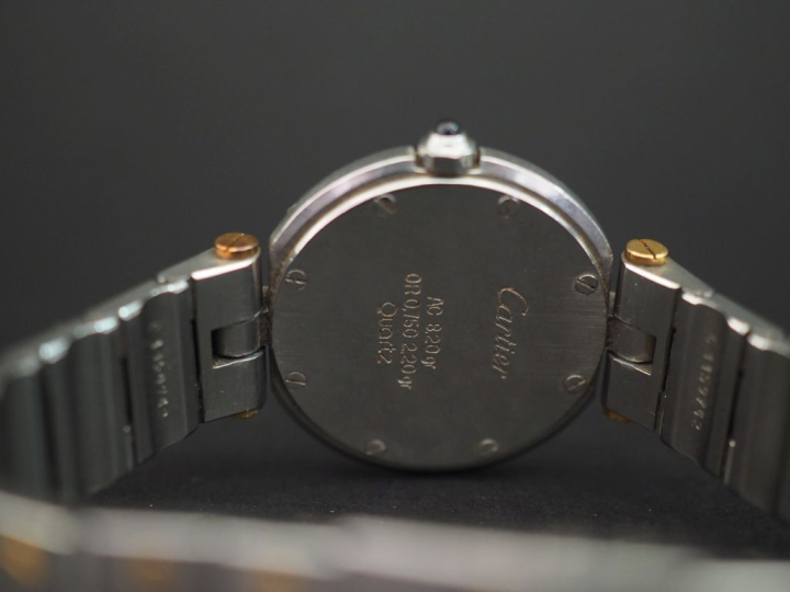CARTIER Santos Montre bracelet de dame en acier et or 18k (750) Boîtie