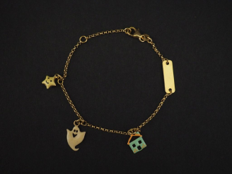 Vente aux enchères Bracelet souple en or jaune 750, maille jaseron, agrémenté de de trois