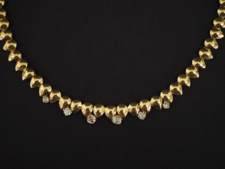 Vente aux enchères Collier articulé en or jaune 750, composé de maillons pastilles et agr