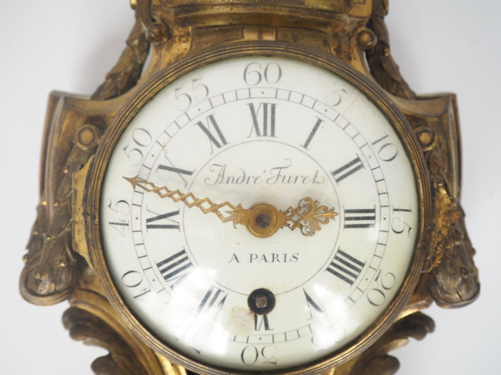 Cartel d'applique XIXème de style  Louis XVI en bronze doré, à décor d