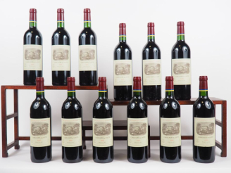 Vente aux enchères 12 BOUTEILLES CARRUADES DE LAFITE PAUILLAC - 2000 - CBO
