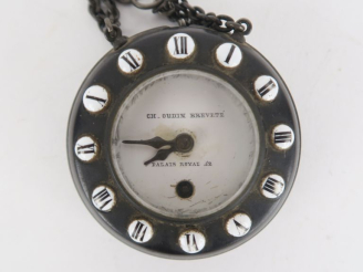 Vente aux enchères Charles OUDIN. Montre de gousset en métal patiné noir. Cadran émaillé 