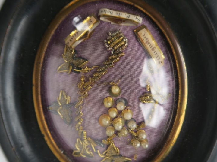 Reliquaire en paperolle à l'éffigie de Saint Augustin, Saint François 