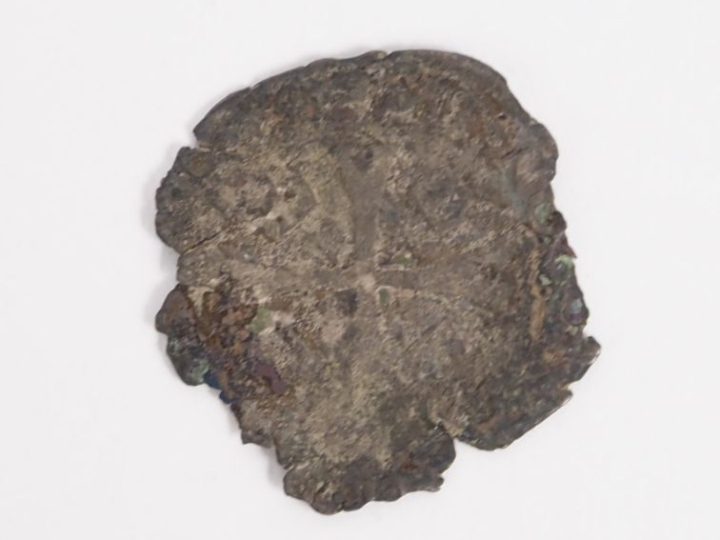 Tête d’Harpocrate en terre cuite avec sa mèche de cheveux caractéristi