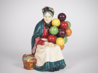 Vente aux enchères Manufacture Royal Doulton England. "The Old balloon seller". Sujet en 
