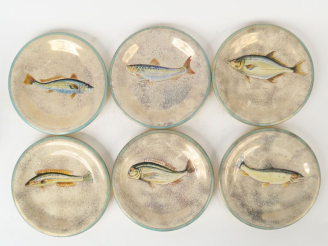 Vente aux enchères Auguste HEILIGENSTEIN. 12 assiettes en porcelaine décor "Chinchart". S