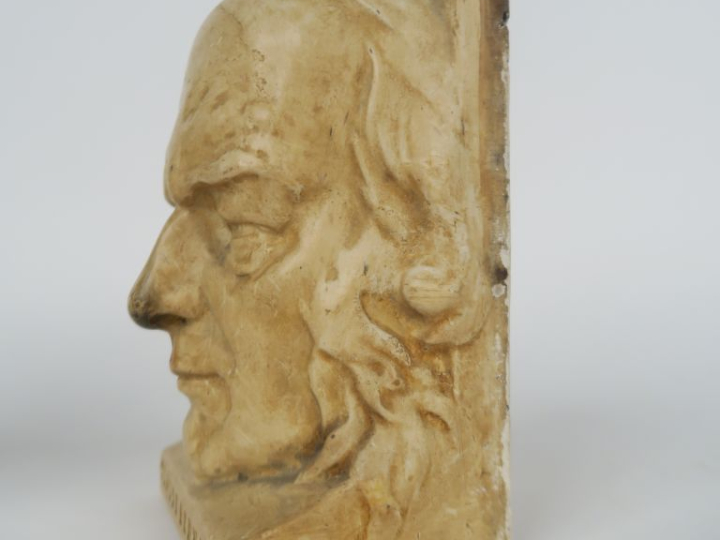 JOUANNY DURAND. Paire de serre-livres en plâtre, "Pasteur" et "Claude 