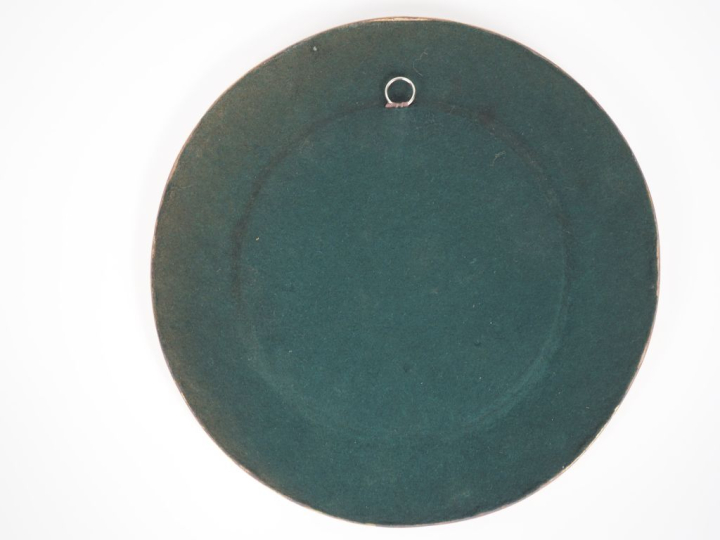 Mithe ESPELT. Miroir circulaire en céramique polychrome à décor de fle