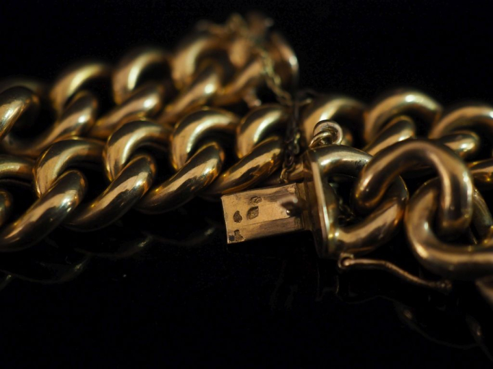 Bracelet souple en or jaune 750, maille gourmette.  Chainette de sécur