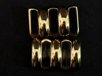 Vente aux enchères Deux éléments de bracelet en or jaune 750 (?). Poids. 4,85 g  À charge