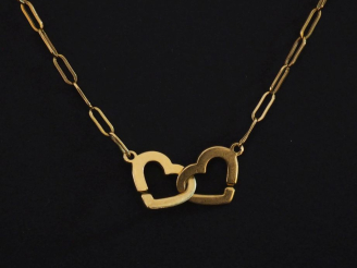 Vente aux enchères DINH VAN  Collier chaine, fermoir menottes cœur. Signé. Long. 42 cm Po