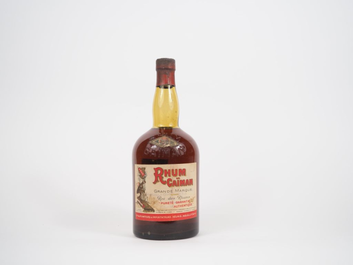 1 VIEILLE BOUTEILLE (75 CL) RHUM CAÏMAN GRANDE MARQUE "ROI DES RHUMS" 