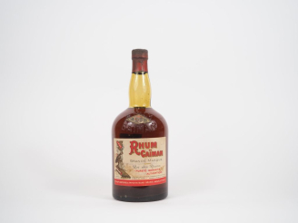 Vente aux enchères 1 VIEILLE BOUTEILLE (75 CL) RHUM CAÏMAN GRANDE MARQUE "ROI DES RHUMS" 