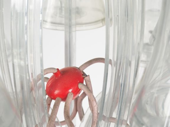 P. STARCK.  Lustre contemporain en plexi glass, à décor de consoles et