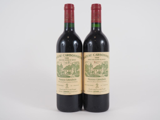 Vente aux enchères 2 BOUTEILLES CHÂTEAU CARBONNIEUX GCC GRAVES - 1990