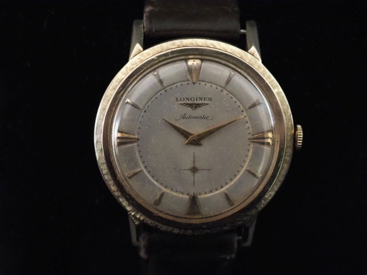 LONGINES Montre bracelet d'homme, boitier en or jaune 585.  Cadran arg