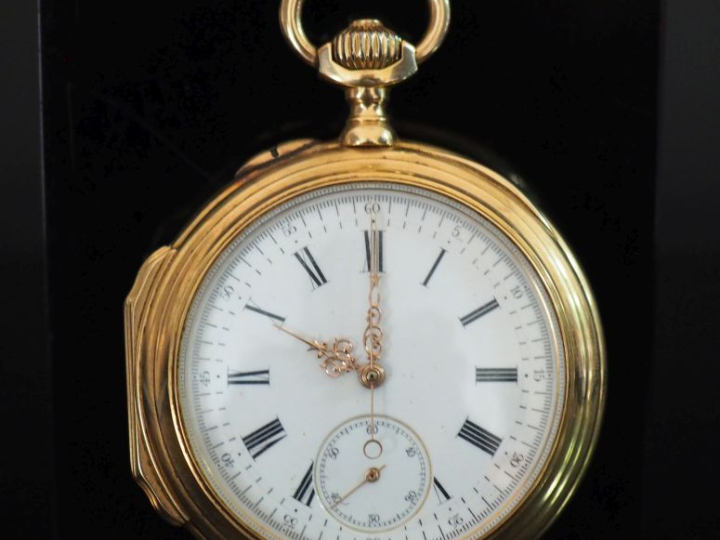 Montre de gousset en or jaune 750.  Cadran à chiffres romains pour les