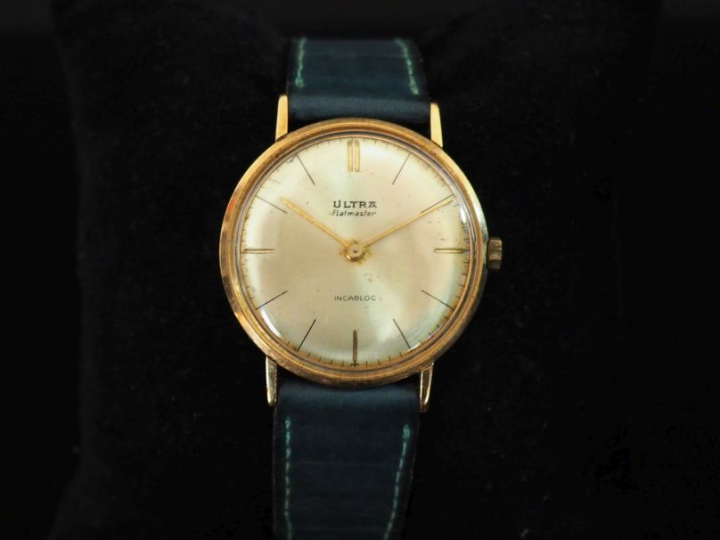 ULTRA, Flatmaster Montre bracelet, boitier en or jaune 750.  Cadran ro