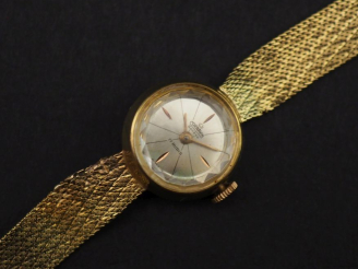 Vente aux enchères CORNAVIN, Genève Montre bracelet de dame, boitier et bracelet en or ja