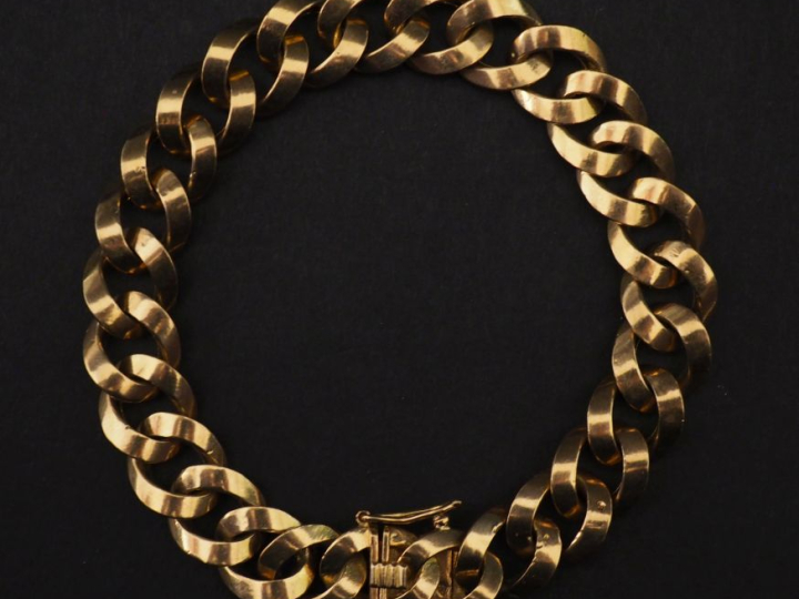 Bracelet souple en or jaune 750, maille plate ronde.  Long. 18,5 cm Po