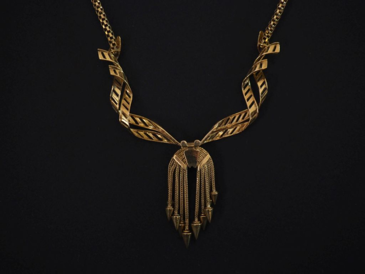 Collier souple en or jaune 750, maille dite tubogaze, agrémentée en so