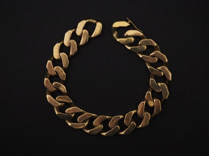 Bracelet souple en or jaune 750, maille gourmette.  Larg. 1,3 cm Long.