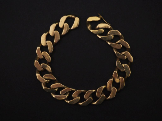 Vente aux enchères Bracelet souple en or jaune 750, maille gourmette.  Larg. 1,3 cm Long.