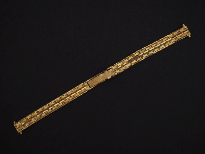 Bracelet de montre en or jaune 750, maille plate à décor de croisillon