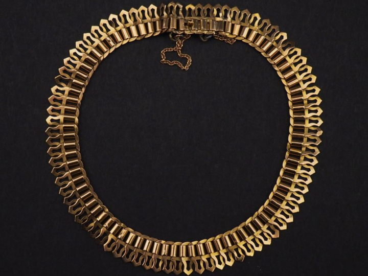Bracelet souple en or jaune 750, composée de maillons ajourés de forme