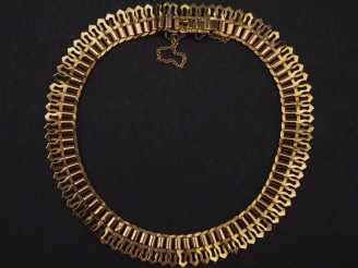 Vente aux enchères Bracelet souple en or jaune 750, composée de maillons ajourés de forme