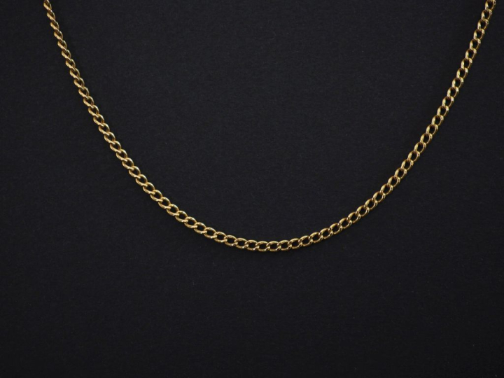 Chaine en or jaune 750, maille gourmette.  Long. 63 cm Poids. 6,70 g (