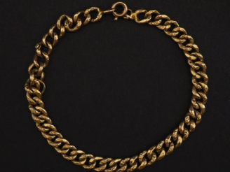 Vente aux enchères Bracelet en or jaune 750, maille gourmette.  Long. 20 cm Poids. 7 g   