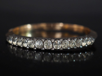 Vente aux enchères Bracelet jonc en or jaune 750 et argent, serti de pierres à l'imitatio