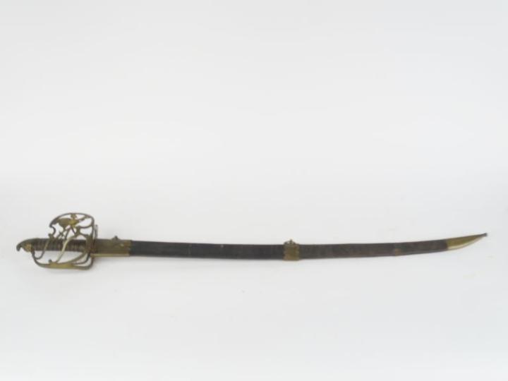 Sabre d’officier volontaire.  Poignée recouvert de cuir avec filigrane