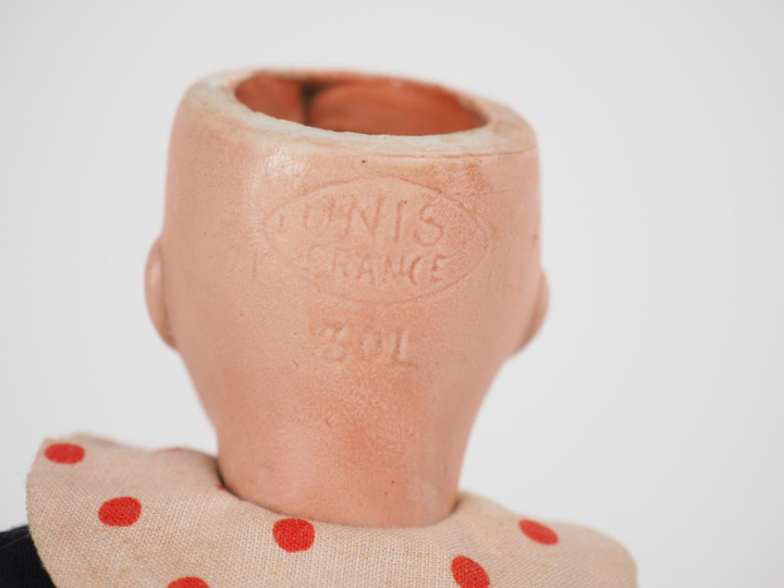 Poupée Bleuette Unis france tête porcelaine  bouche ouverte yeux0 basc