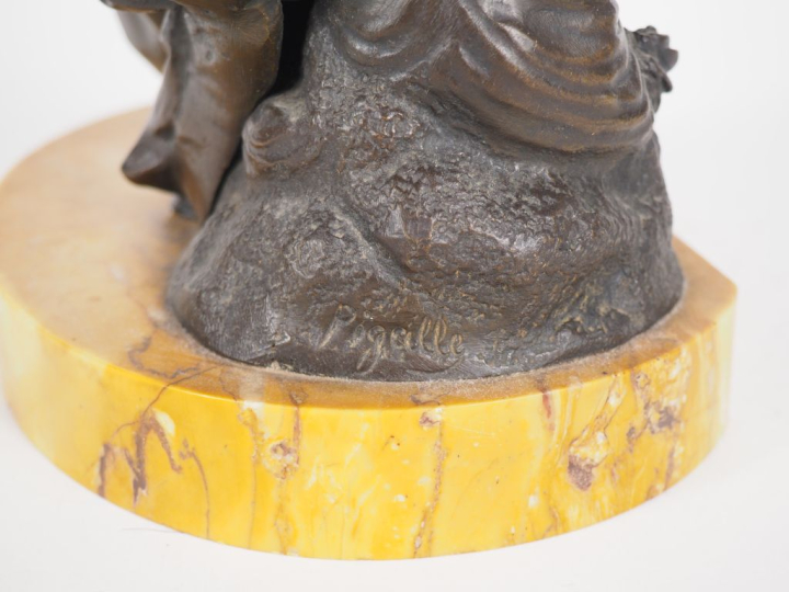 PIGALLE. (D'après)  Sculpture en bronze à patine brune "figure allégor