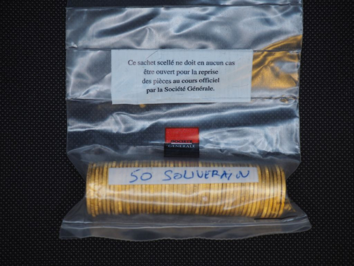 50 souverains or (une date visible 1911) Dans un sachet sous scellé de