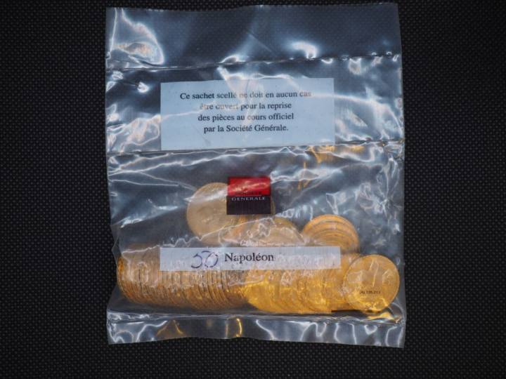 50 pièces de 20 Francs or (une date visible 1909) Dans un sachet sous 