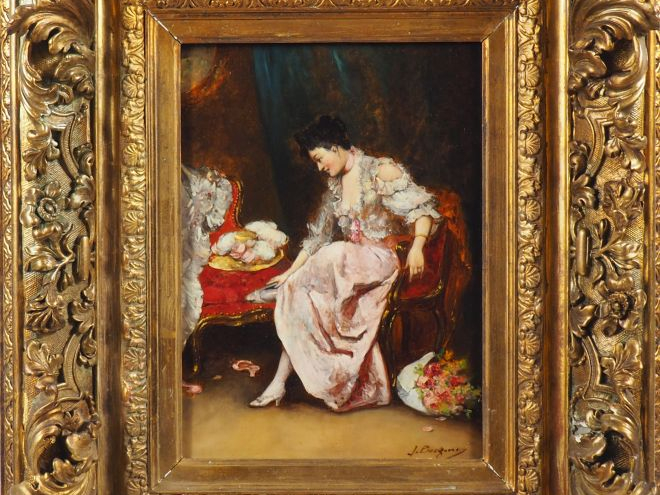 J. BOLZONI.  "Elégante se chaussant" Huile sur panneau, signée en bas 
