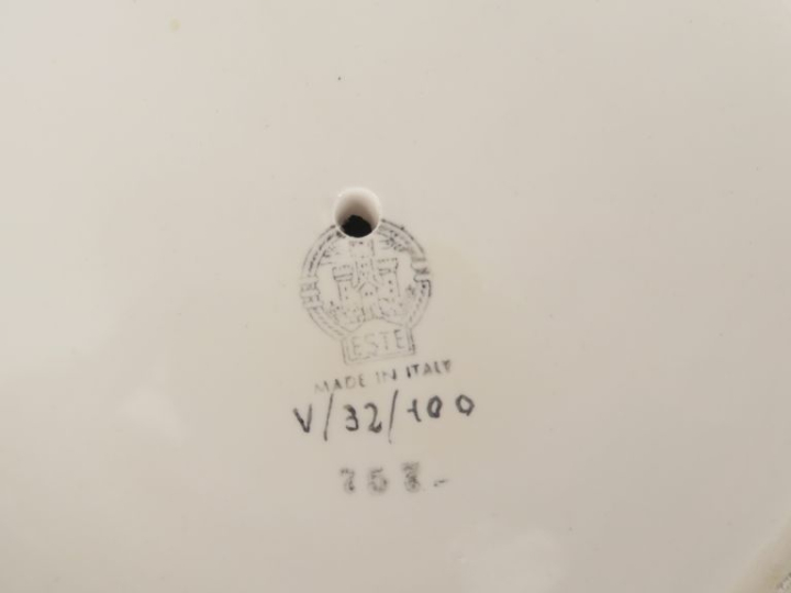 Christian DIOR.  Paire de vases Ananas en porcelaine argentée. Signés.